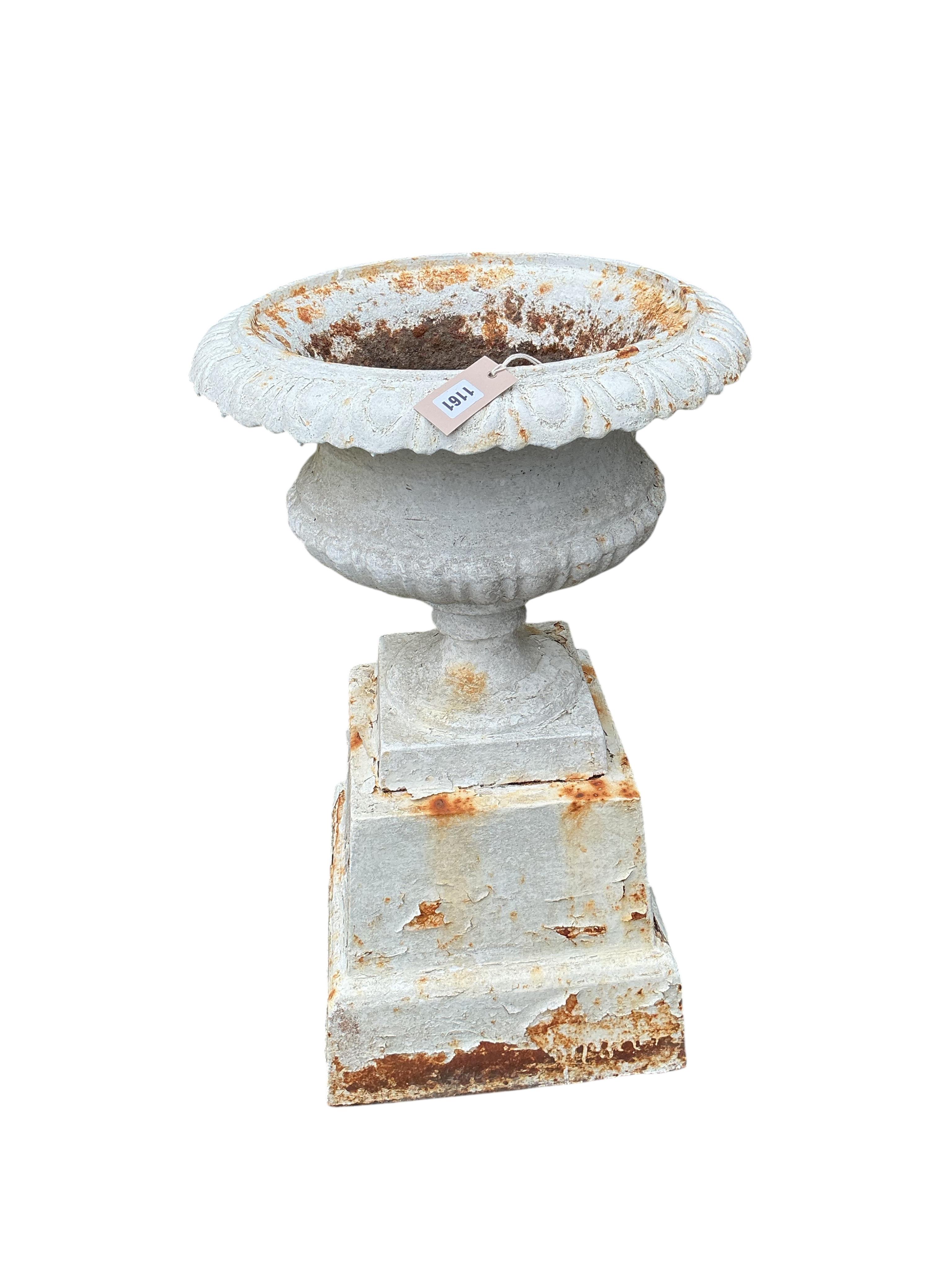 A pair of Victorian painted cast iron campana urns on square bases, diameter 48cm, height 80cm